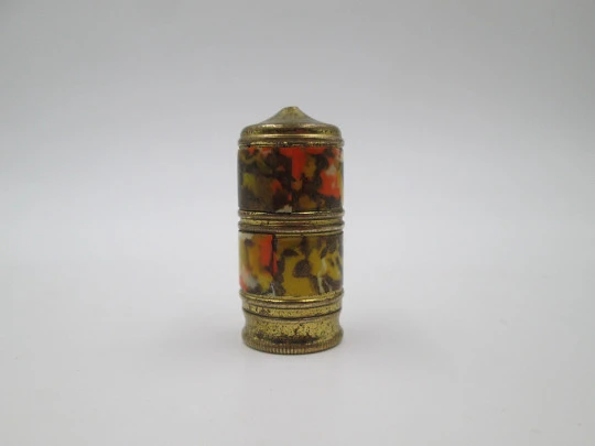 Petrol cylindrical pocket lighter. Golden metal & colored enamel. 1980's