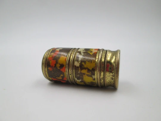 Petrol cylindrical pocket lighter. Golden metal & colored enamel. 1980's