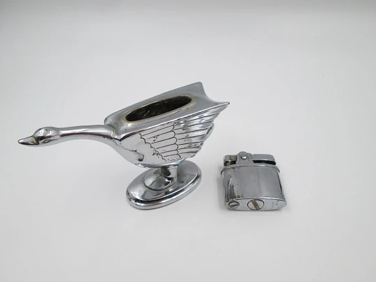 Petrol figurative table lighter. Silver plated metal. Swan shape. Japan. 1960's Petrol figurative table lighter. Silver plated metal. Swan shape. Japan. 1960's