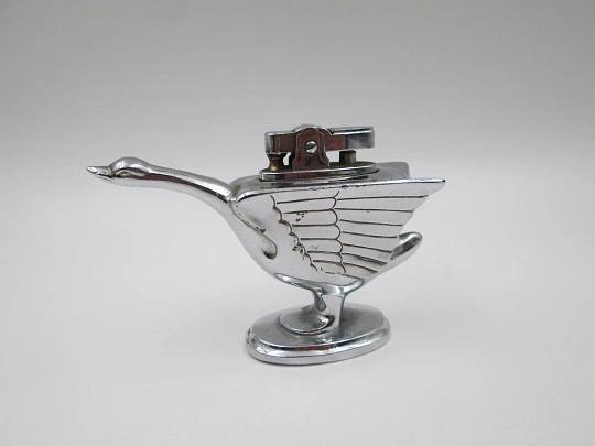Petrol figurative table lighter. Silver plated metal. Swan shape. Japan. 1960's Petrol figurative table lighter. Silver plated metal. Swan shape. Japan. 1960's