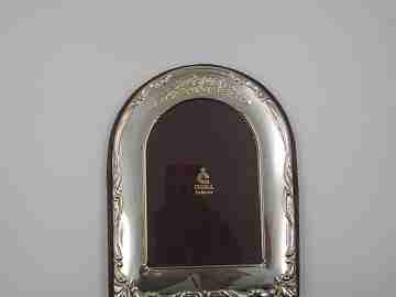 Photo frame. Sterling silver. Scrolls & floral motifs. Cunill Goldsmiths