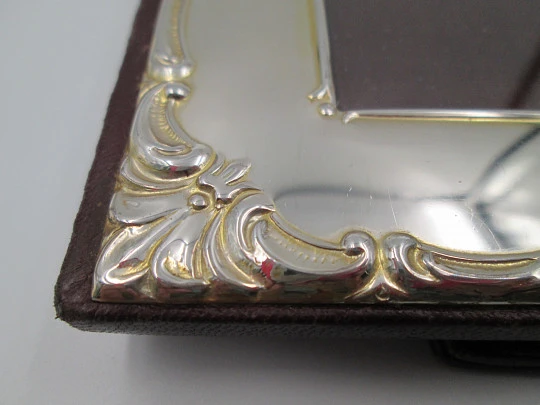 Photo frame. Sterling silver. Scrolls & floral motifs. Cunill Goldsmiths