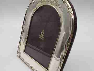 Photo frame. Sterling silver. Scrolls & floral motifs. Cunill Goldsmiths