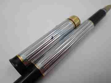 Pierre Cardin fountain pen. Silver and gold plated. Black resin. Cartridge. 1980's