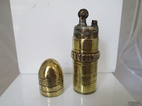 Pierre. Bullet shaped. Austria. 1960's. Petrol. Golden metal