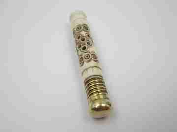Pincushion. Carved openwork bone and golden metal. Circular pattern
