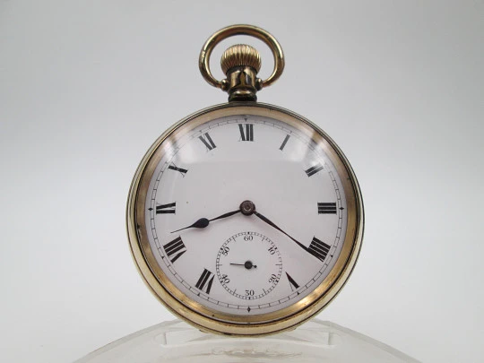 Pinnacle open-face pocket watch. Gold plated metal. Stem winding. England / Swiss. 1930's