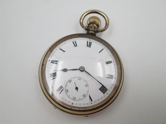 Pinnacle open-face pocket watch. Gold plated metal. Stem winding. England / Swiss. 1930's