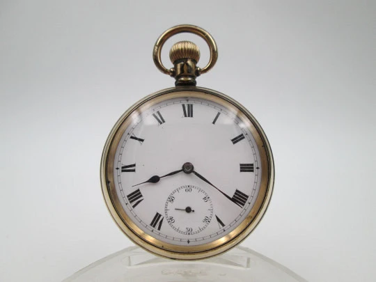 Pinnacle open-face pocket watch. Gold plated metal. Stem winding. England / Swiss. 1930's