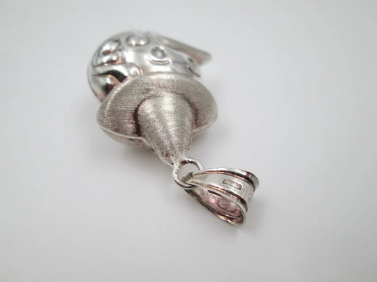 Pinocchio women's pendant. Glossy and satin sterling silver. Ring top. 1990's