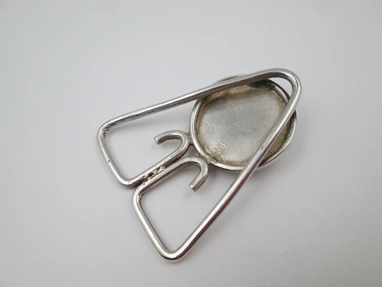 Pinza clip sujeta billetes. Plata de ley. Motivo concha de Santiago. España. 1980