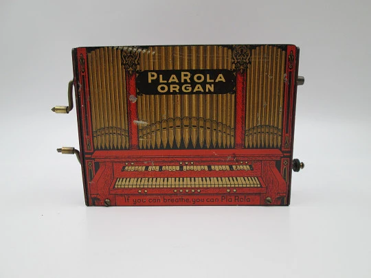 PlaRola Organ portable automatic harmonica. Lithographed tinplate. Perforated rolls. 1930's