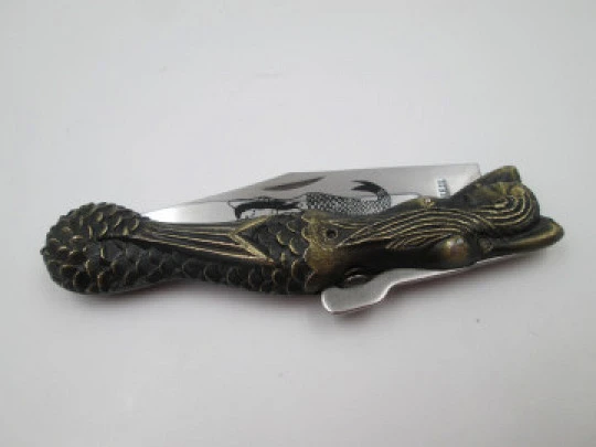 Pocket knife. Bronze and steel. Handle and mermaid engraving. Lock system. 1980's