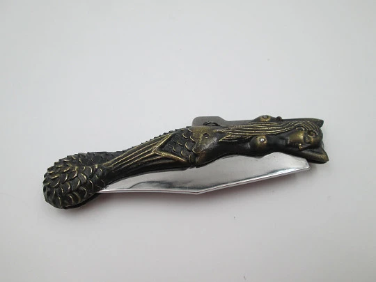 Pocket knife. Bronze and steel. Handle and mermaid engraving. Lock system. 1980's