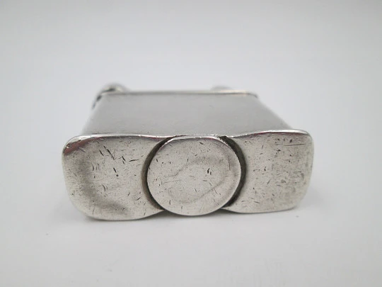 Pocket petrol lighter. Hammer type. Sterling silver. Square shape. Mexico. 1940's