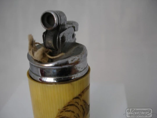 Pocket petrol lighter. Silver-plated and resin. 1940's. Tiger motif Pocket petrol lighter. Silver-plated and resin. 1940's. Tiger motif