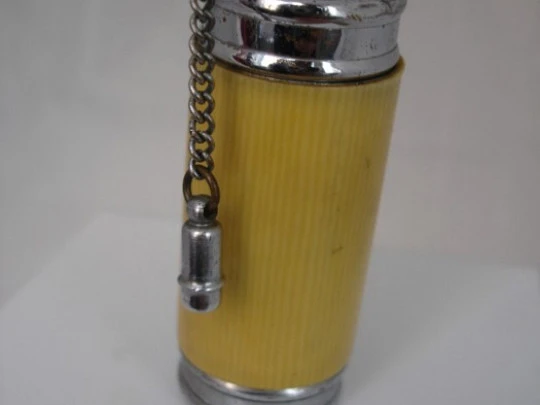 Pocket petrol lighter. Silver-plated and resin. 1940's. Tiger motif Pocket petrol lighter. Silver-plated and resin. 1940's. Tiger motif