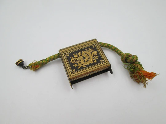 Pocket vesta case with wick and match striker. Damascene-patterned metal. 1930's Pocket vesta case with wick and match striker. Damascene-patterned metal. 1930's