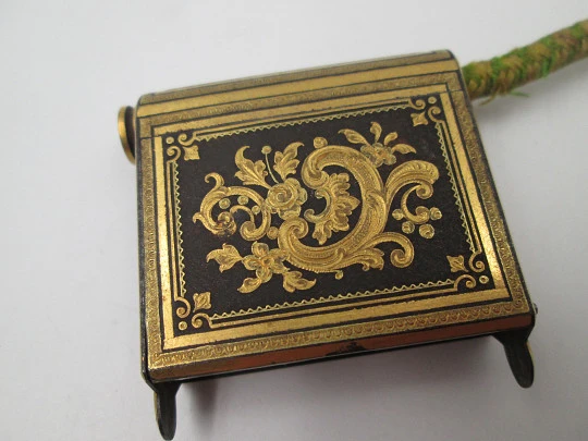 Pocket vesta case with wick and match striker. Damascene-patterned metal. 1930's Pocket vesta case with wick and match striker. Damascene-patterned metal. 1930's