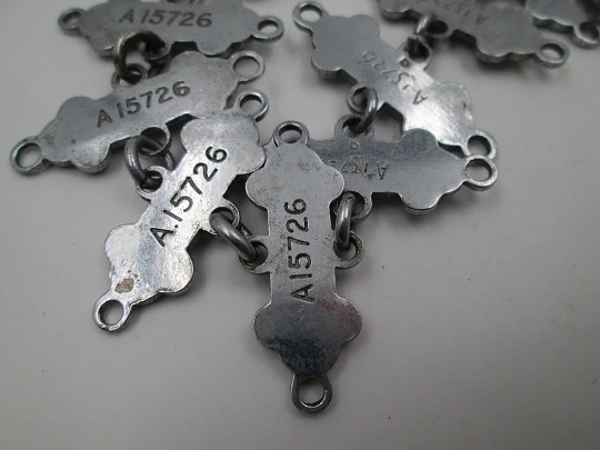 Pocket watch chain with St John Ambulance medal and yearly examination bars. 1950's