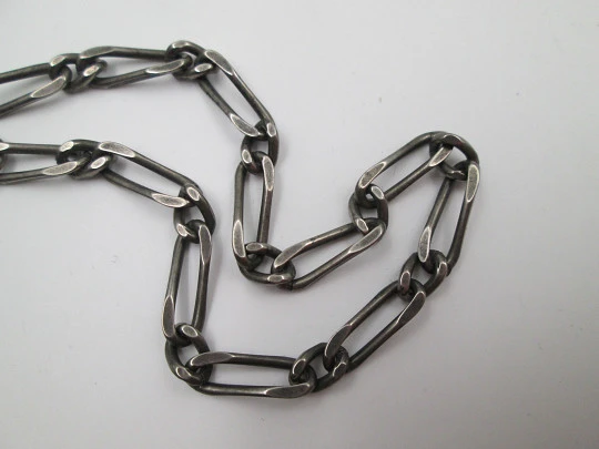Pocket watch chain. Blacked metal. Openworks links. Spring ring clasp. 1940's