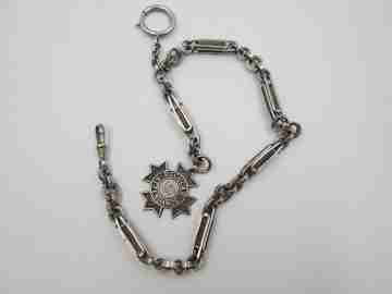 Pocket watch chain. Rings & openwork cylinders. Silver. Pendant. 1910