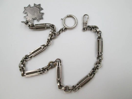 Pocket watch chain. Rings & openwork cylinders. Silver. Pendant. 1910