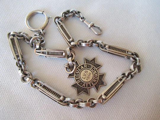 Pocket watch chain. Rings & openwork cylinders. Silver. Pendant. 1910