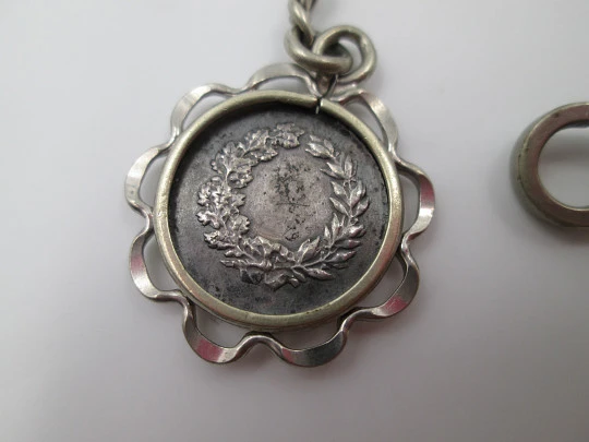 Pocket watch chain. Silver plated. Hurdle jumper pendant. 1920