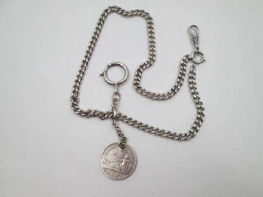 Pocket watch curb flat link chain. Sterling silver. Peseta coin pendant. 1900's. Europe