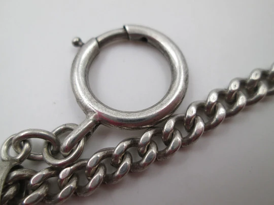 Pocket watch curb flat link chain. Sterling silver. Peseta coin pendant. 1900's. Europe