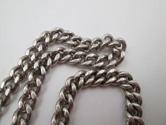 Pocket watch curb flat link chain. Sterling silver. Peseta coin pendant. 1900's. Europe