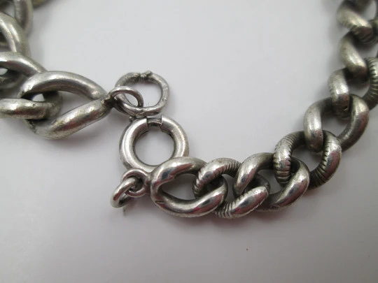 Pocket watch curb link chain. Sterling silver. Spring ring clasp. Linear motifs. Europe. 1900's