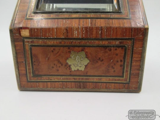 Pocket watch exhibition table box. Wood, bronze and beveled glass. 1910'a