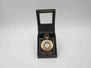 Pocket watch exhibition table box. Wood, bronze and nacre ornates. 1910's. Europe