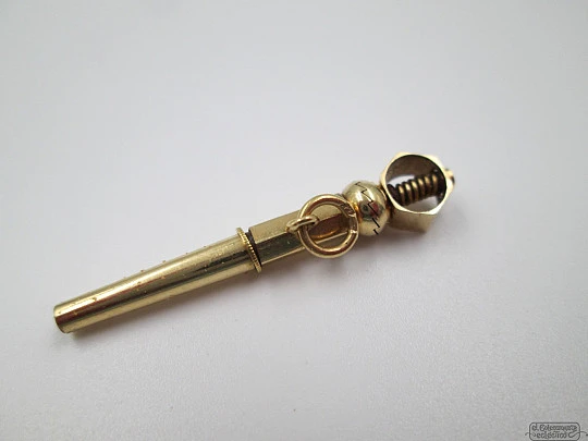 Pocket watch key fob. 18 karat gold. 19th century. Hexagon and ball