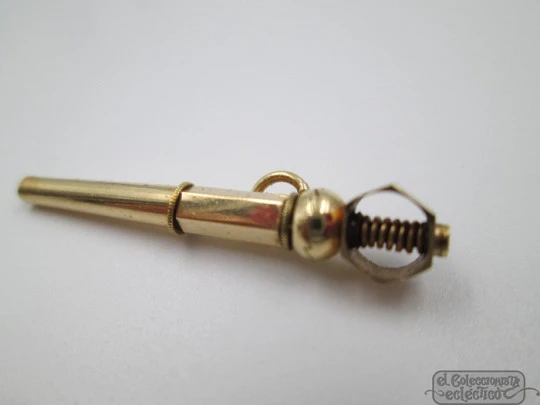 Pocket watch key fob. 18 karat gold. 19th century. Hexagon and ball