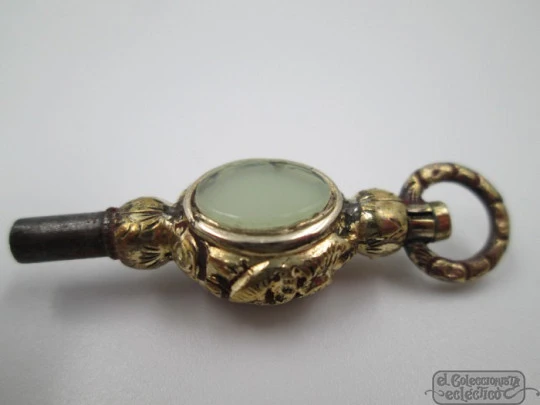 Pocket watch key fob. Gold plated. 19th century. Colour stones