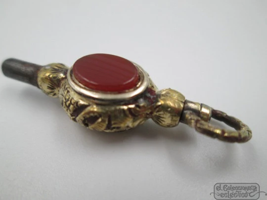 Pocket watch key fob. Gold plated. 19th century. Colour stones