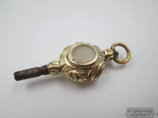 Pocket watch key fob. Gold plated. 19th century. Colour stones and leaves