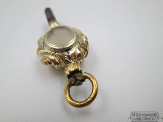 Pocket watch key fob. Gold plated. 19th century. Colour stones and leaves