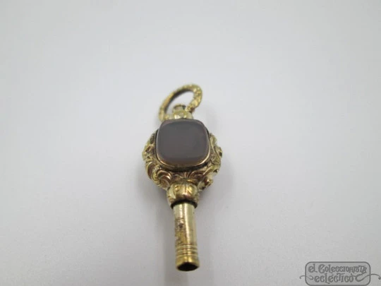 Pocket watch key fob. Gold plated. 19th century. Grey and black stones