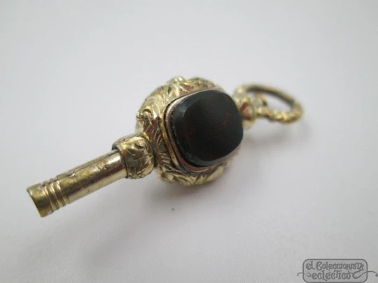 Pocket watch key fob. Gold plated. 19th century. Grey and black stones
