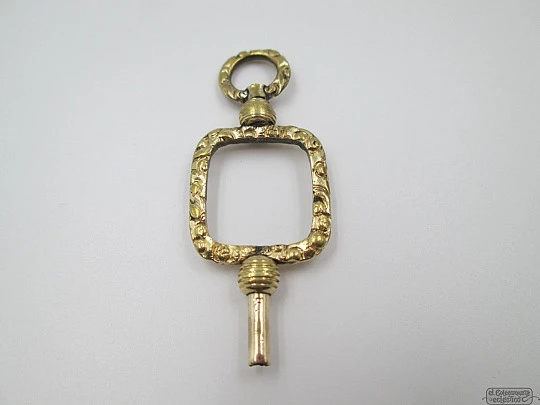 Pocket watch key fob. Gold plated. 19th century. Openwork. Square design