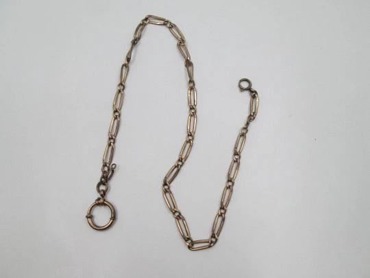 Pocket watch openwork links chain. Gold plated metal. Spring ring clasp. Europe. 1900's