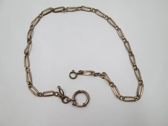 Pocket watch openwork links chain. Gold plated metal. Spring ring clasp. Europe. 1900's