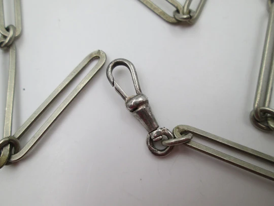 Pocket watch openwork links chain. Silver plated metal. Carabiner clasp. Europe. 1910's