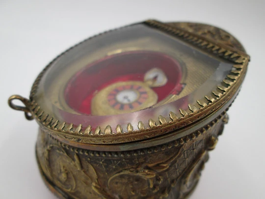 Pocket watch ornate exhibition table box. Gold plated metal. 1900's. Relief