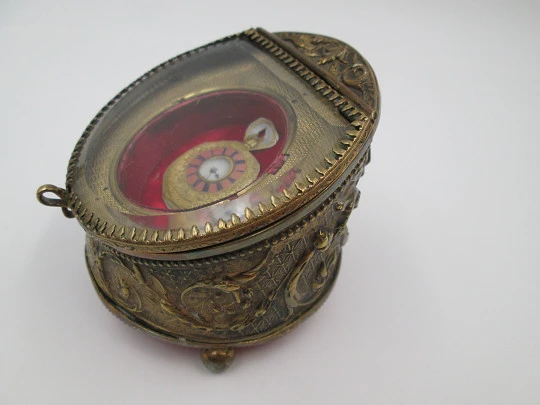 Pocket watch ornate exhibition table box. Gold plated metal. 1900's. Relief