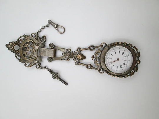 Pocket watch with chatelaine. Silver plated metal. Key-wind. 19th century